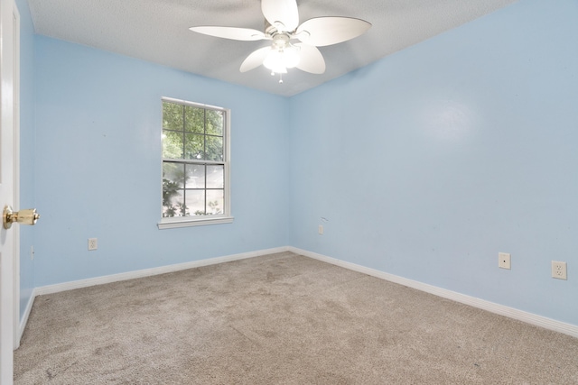 209 Warrior St, Crestview, FL 32536 - carpeted spare room with ceiling fan, baseboards, and a textured ceiling