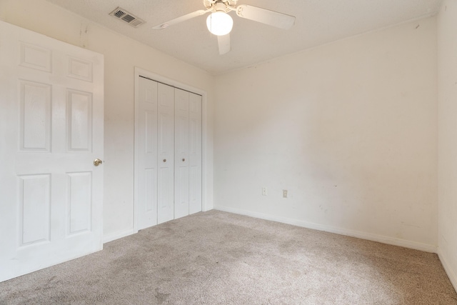 209 Warrior St, Crestview, FL 32536 - unfurnished bedroom featuring carpet, a closet, and baseboards