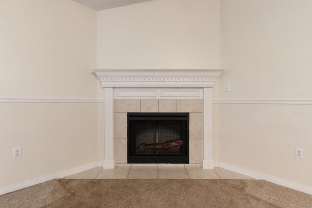 209 Warrior St, Crestview, FL 32536 - detailed view of carpet floors, a tiled fireplace, and baseboards