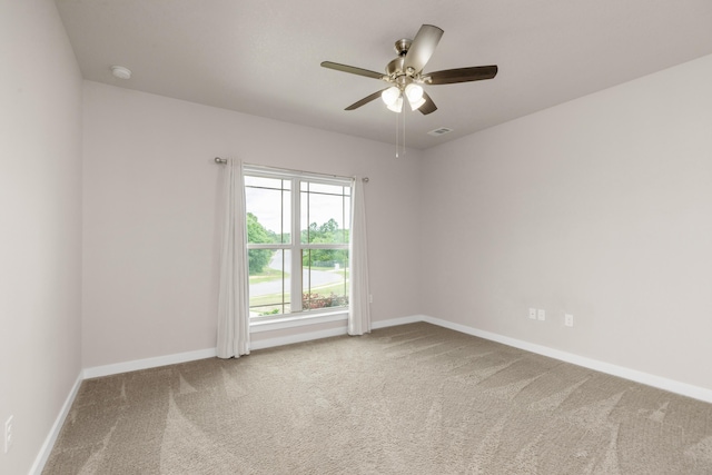 6437 Amanda Ct, Crestview, FL 32536 - unfurnished room featuring carpet flooring, baseboards, a ceiling fan, and a smoke detector