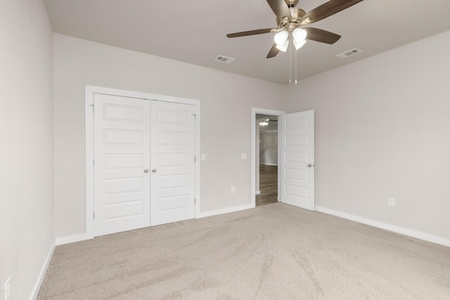6437 Amanda Ct, Crestview, FL 32536 - unfurnished bedroom featuring light carpet, baseboards, a closet, and ceiling fan