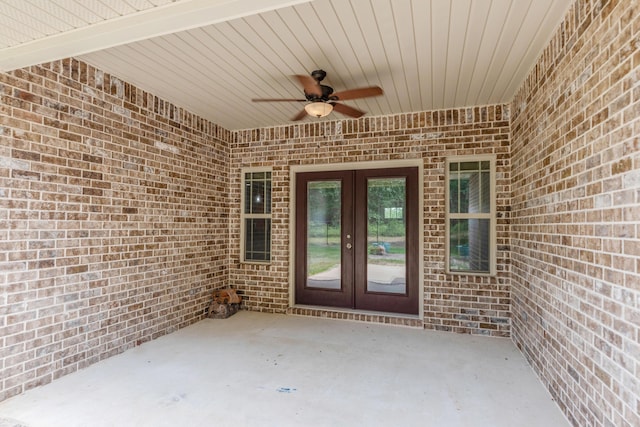 6437 Amanda Ct, Crestview, FL 32536 - property entrance featuring french doors, brick siding, a ceiling fan, and a patio