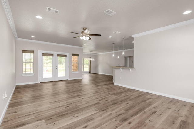 6437 Amanda Ct, Crestview, FL 32536 - unfurnished living room featuring ornamental molding, recessed lighting, baseboards, ceiling fan, and wood finished floors