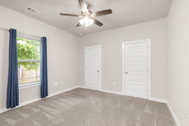 6437 Amanda Ct, Crestview, FL 32536 - unfurnished bedroom with carpet, baseboards, and a ceiling fan