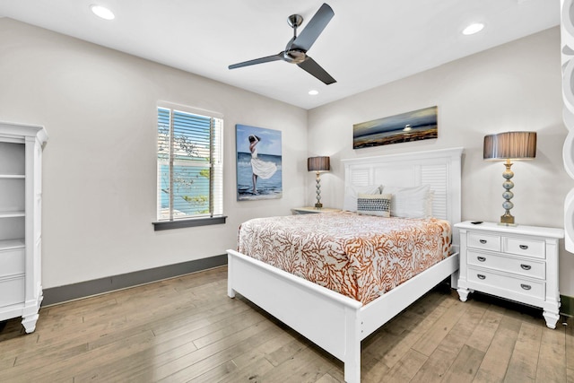 151 Penelope St, Miramar Beach, FL 32550 - bedroom with hardwood / wood-style floors, recessed lighting, baseboards, and ceiling fan