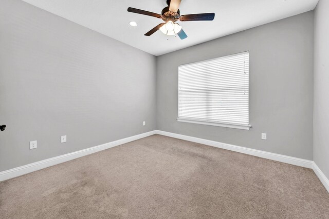 50 Oyster Blvd, Freeport, FL 32439 - carpeted spare room with baseboards, a ceiling fan, and recessed lighting