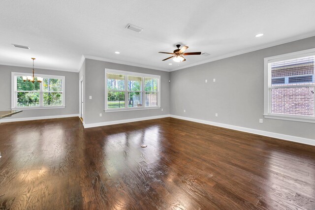 50 Oyster Blvd, Freeport, FL 32439 - unfurnished room featuring a chandelier, crown molding, plenty of natural light, ceiling fan, and baseboards