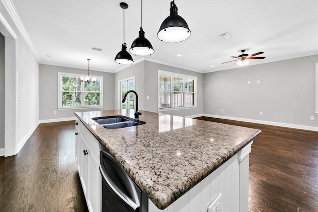 50 Oyster Blvd, Freeport, FL 32439 - kitchen featuring a sink, dishwasher, dark wood-style floors, an island with sink, and baseboards