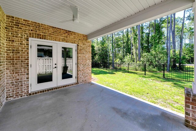 50 Oyster Blvd, Freeport, FL 32439 - view of patio featuring french doors and ceiling fan