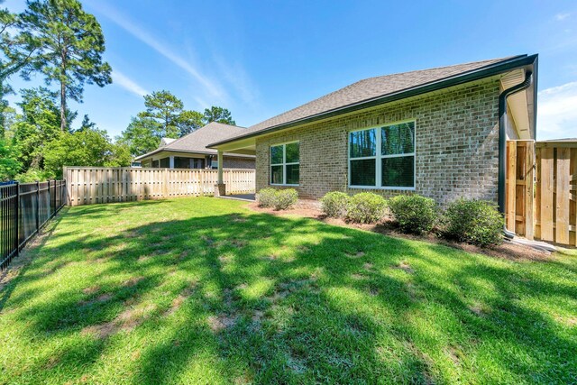 50 Oyster Blvd, Freeport, FL 32439 - back of property with brick siding