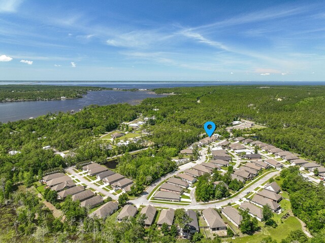 50 Oyster Blvd, Freeport, FL 32439 - aerial view of property's location with nearby suburban area, a nearby body of water, and a forest