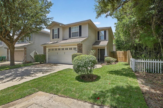 2909 Five Oaks Ln, Shalimar, FL 32579 - traditional home with a garage, driveway, roof with shingles, and stone siding