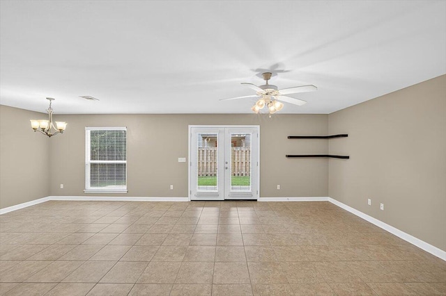 2909 Five Oaks Ln, Shalimar, FL 32579 - unfurnished room with plenty of natural light, a chandelier, light tile patterned flooring, and ceiling fan