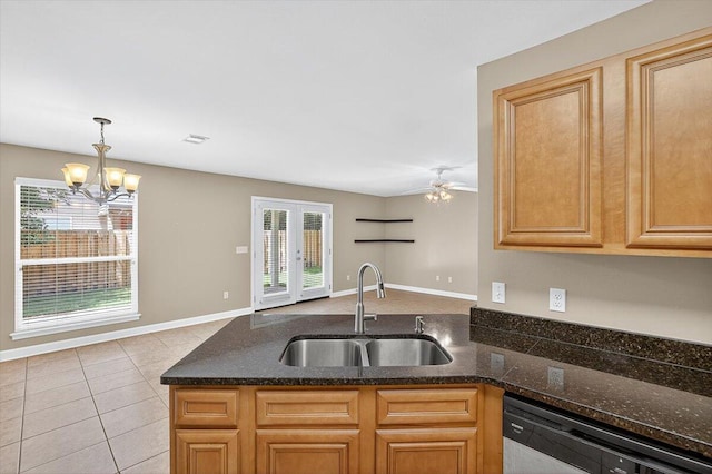 2909 Five Oaks Ln, Shalimar, FL 32579 - kitchen with a peninsula, stainless steel dishwasher, healthy amount of natural light, and a chandelier