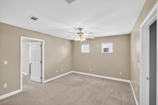 2909 Five Oaks Ln, Shalimar, FL 32579 - empty room with light carpet and ceiling fan
