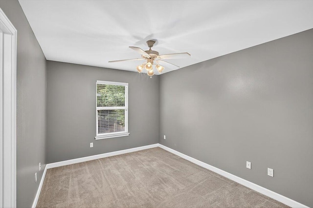 2909 Five Oaks Ln, Shalimar, FL 32579 - empty room with ceiling fan and carpet