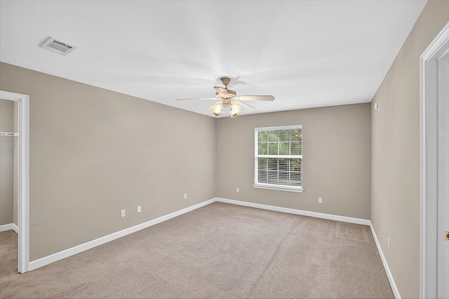 2909 Five Oaks Ln, Shalimar, FL 32579 - carpeted empty room with ceiling fan and baseboards