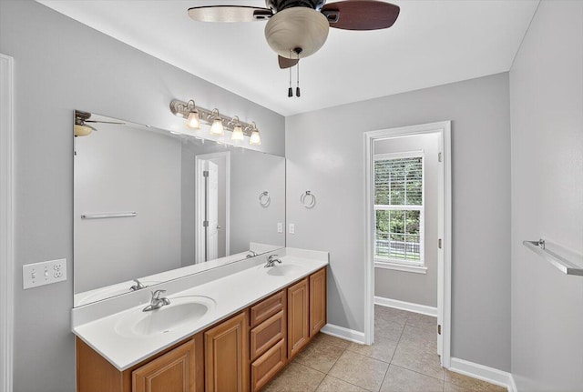 2909 Five Oaks Ln, Shalimar, FL 32579 - full bathroom featuring double vanity, ceiling fan, and tile patterned floors