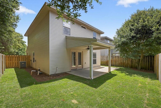 2909 Five Oaks Ln, Shalimar, FL 32579 - rear view of property with ceiling fan, french doors, a patio area, and a fenced backyard