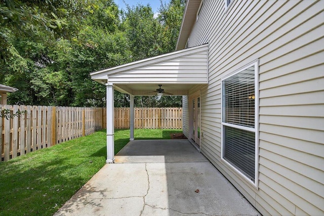 2909 Five Oaks Ln, Shalimar, FL 32579 - fenced backyard featuring ceiling fan and a patio area