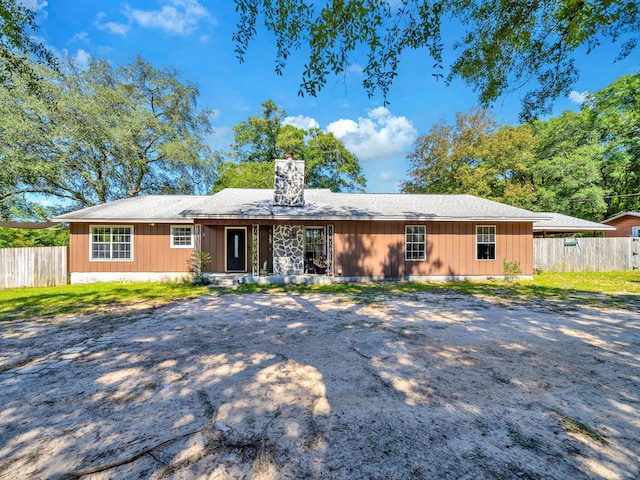 3241 Auburn Rd, Crestview, FL 32539 - single story home featuring a chimney and roof with shingles