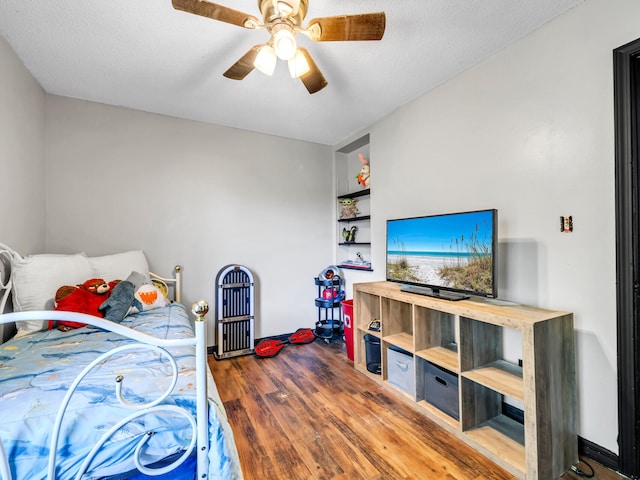 3241 Auburn Rd, Crestview, FL 32539 - bedroom featuring wood finished floors and a ceiling fan