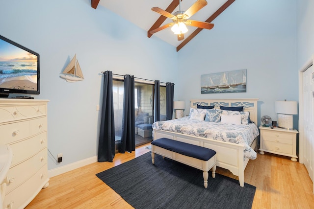 25 Misty Cv Unit 115, Miramar Beach, FL 32550 - bedroom featuring light wood-style floors, high vaulted ceiling, beam ceiling, access to outside, and baseboards