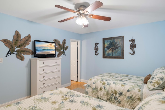 25 Misty Cv Unit 115, Miramar Beach, FL 32550 - bedroom featuring light wood-style flooring, baseboards, and ceiling fan
