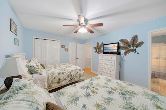 25 Misty Cv Unit 115, Miramar Beach, FL 32550 - bedroom with a closet, light wood-type flooring, a ceiling fan, and ensuite bathroom