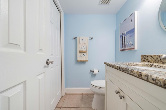 25 Misty Cv Unit 115, Miramar Beach, FL 32550 - bathroom featuring vanity, toilet, tile patterned floors, and baseboards