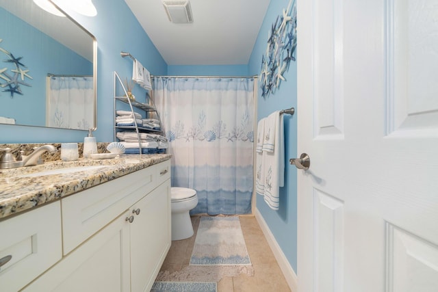 25 Misty Cv Unit 115, Miramar Beach, FL 32550 - full bath with vanity, toilet, tile patterned floors, and curtained shower