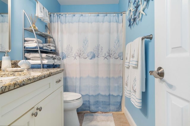 25 Misty Cv Unit 115, Miramar Beach, FL 32550 - bathroom featuring vanity, toilet, tile patterned floors, and curtained shower
