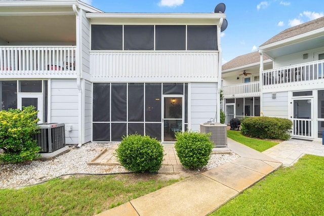 25 Misty Cv Unit 115, Miramar Beach, FL 32550 - back of property featuring cooling unit and a sunroom