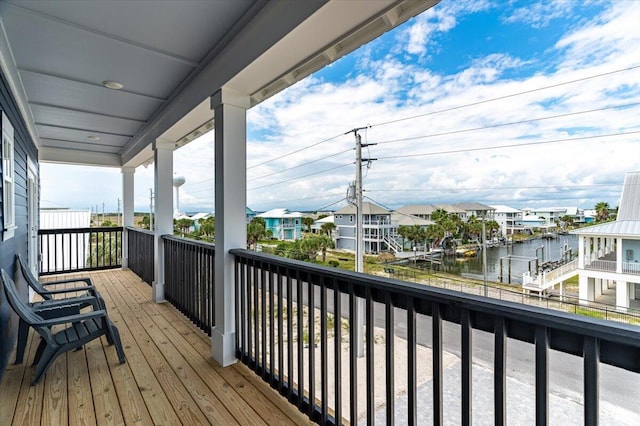 8169 White Sands Blvd, Navarre, FL 32566 - wooden deck with a water view and a residential view