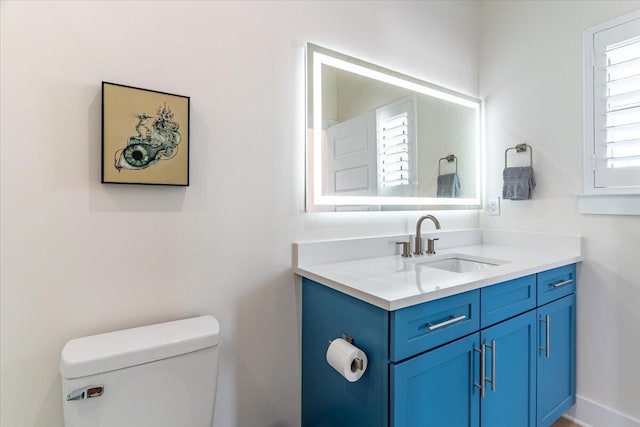 8169 White Sands Blvd, Navarre, FL 32566 - half bathroom with toilet and vanity