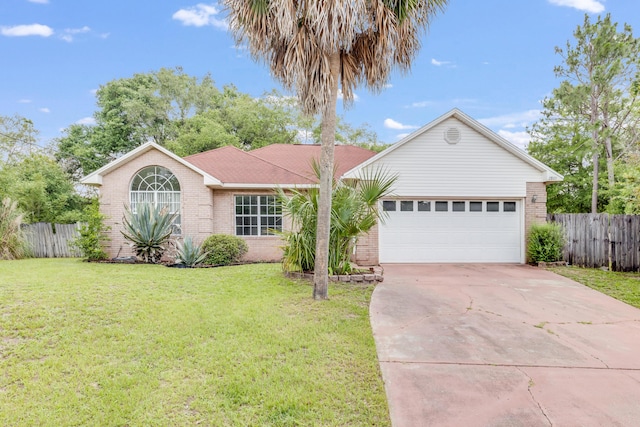 2803 Macgregor Ln, Crestview, FL 32539 - ranch-style home featuring brick siding, concrete driveway, and a garage