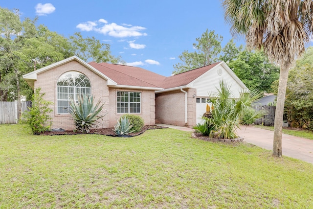 2803 Macgregor Ln, Crestview, FL 32539 - ranch-style home featuring brick siding, a garage, and concrete driveway