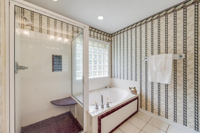 2803 Macgregor Ln, Crestview, FL 32539 - full bath featuring a shower stall, a jetted tub, tile patterned floors, recessed lighting, and wallpapered walls
