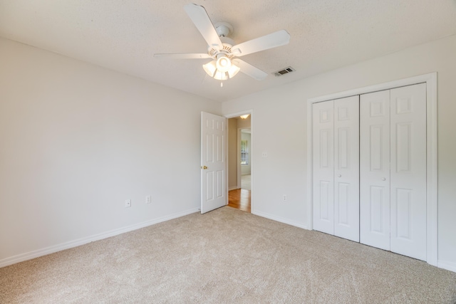 2803 Macgregor Ln, Crestview, FL 32539 - unfurnished bedroom with carpet floors, baseboards, a closet, and ceiling fan