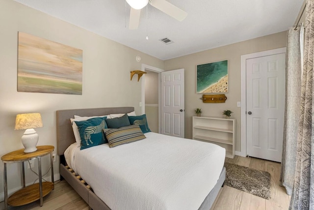 15 Cypress St Unit 268, Santa Rosa Beach, FL 32459 - bedroom with light wood-type flooring, a ceiling fan, and baseboards