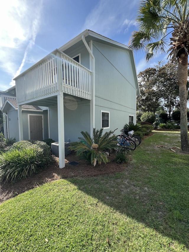 15 Cypress St Unit 268, Santa Rosa Beach, FL 32459 - view of property exterior with a yard and a balcony