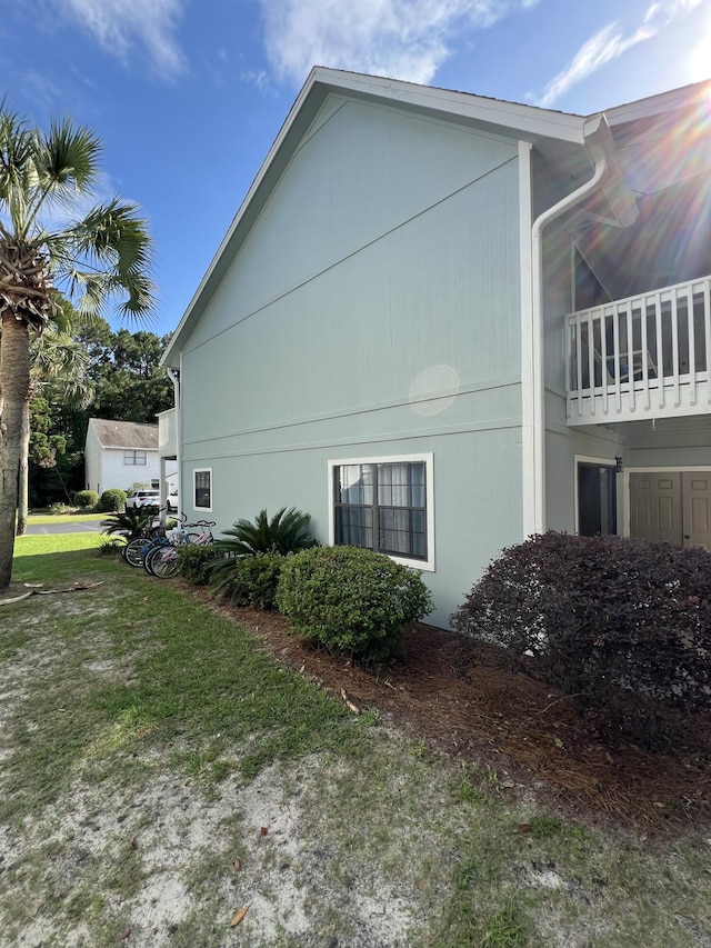 15 Cypress St Unit 268, Santa Rosa Beach, FL 32459 - view of home's exterior featuring a balcony and a yard