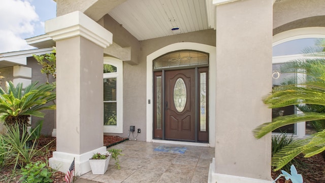 108 Colony Bay Harbour Dr, Panama City Beach, FL 32407 - view of exterior entry with stucco siding