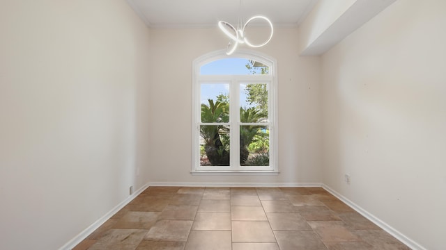 108 Colony Bay Harbour Dr, Panama City Beach, FL 32407 - empty room with ornamental molding, baseboards, and a chandelier