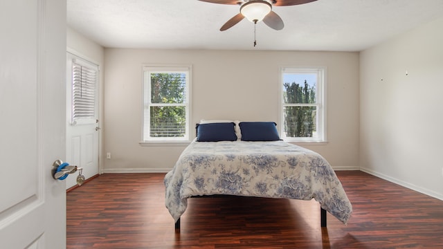 108 Colony Bay Harbour Dr, Panama City Beach, FL 32407 - bedroom featuring dark wood finished floors, baseboards, and ceiling fan