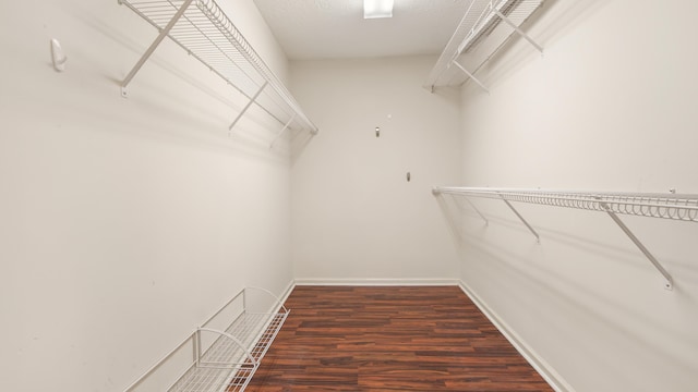 108 Colony Bay Harbour Dr, Panama City Beach, FL 32407 - walk in closet featuring wood finished floors