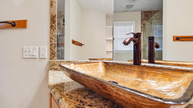 108 Colony Bay Harbour Dr, Panama City Beach, FL 32407 - bathroom featuring vanity and tiled shower