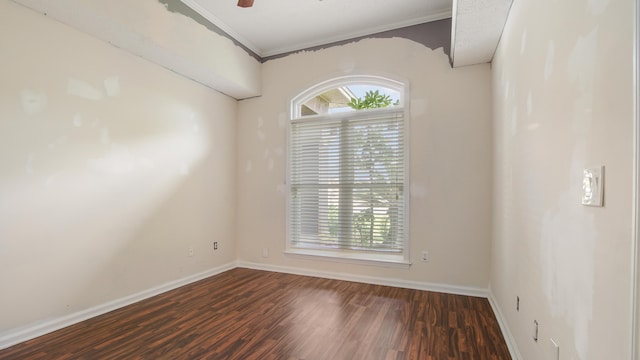 108 Colony Bay Harbour Dr, Panama City Beach, FL 32407 - unfurnished room featuring baseboards, plenty of natural light, dark wood-type flooring, ornamental molding, and a ceiling fan