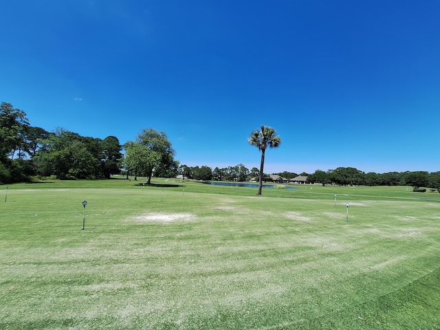 108 Colony Bay Harbour Dr, Panama City Beach, FL 32407 - view of home's community featuring golf course view, a lawn, and a water view