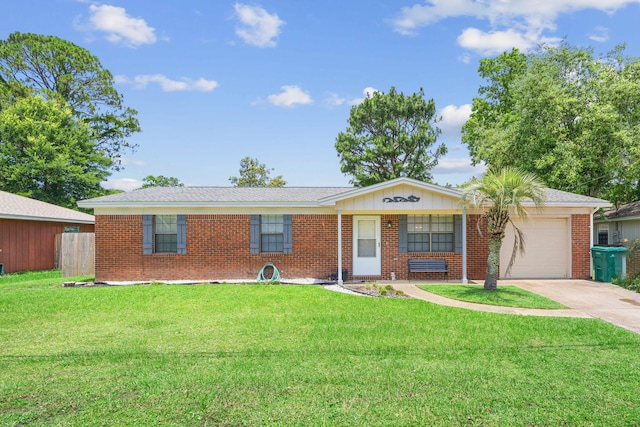 617 Schneider Dr, Fort Walton Beach, FL 32547 - single story home featuring a garage, driveway, a front yard, and brick siding